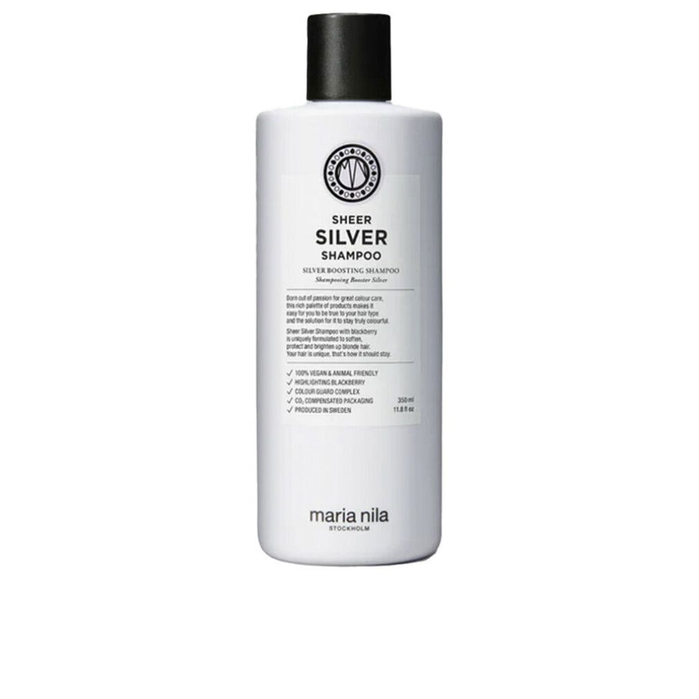Flacone di shampoo bianco con tappo nero. Scritta: Sheer Silver Shampoo. Marchio: Maria Nila.
