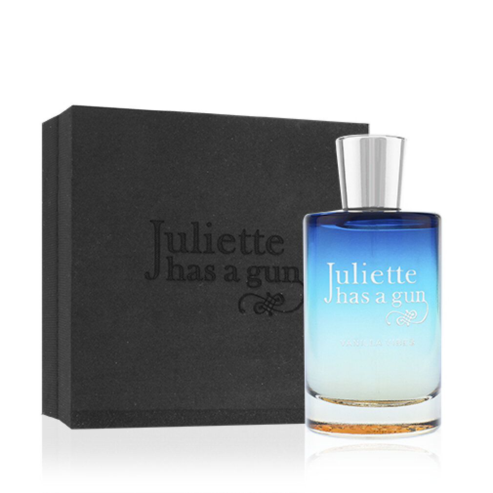 Flacone di profumo e confezione. Confezione nera. Flacone con sfumatura blu-gialla.