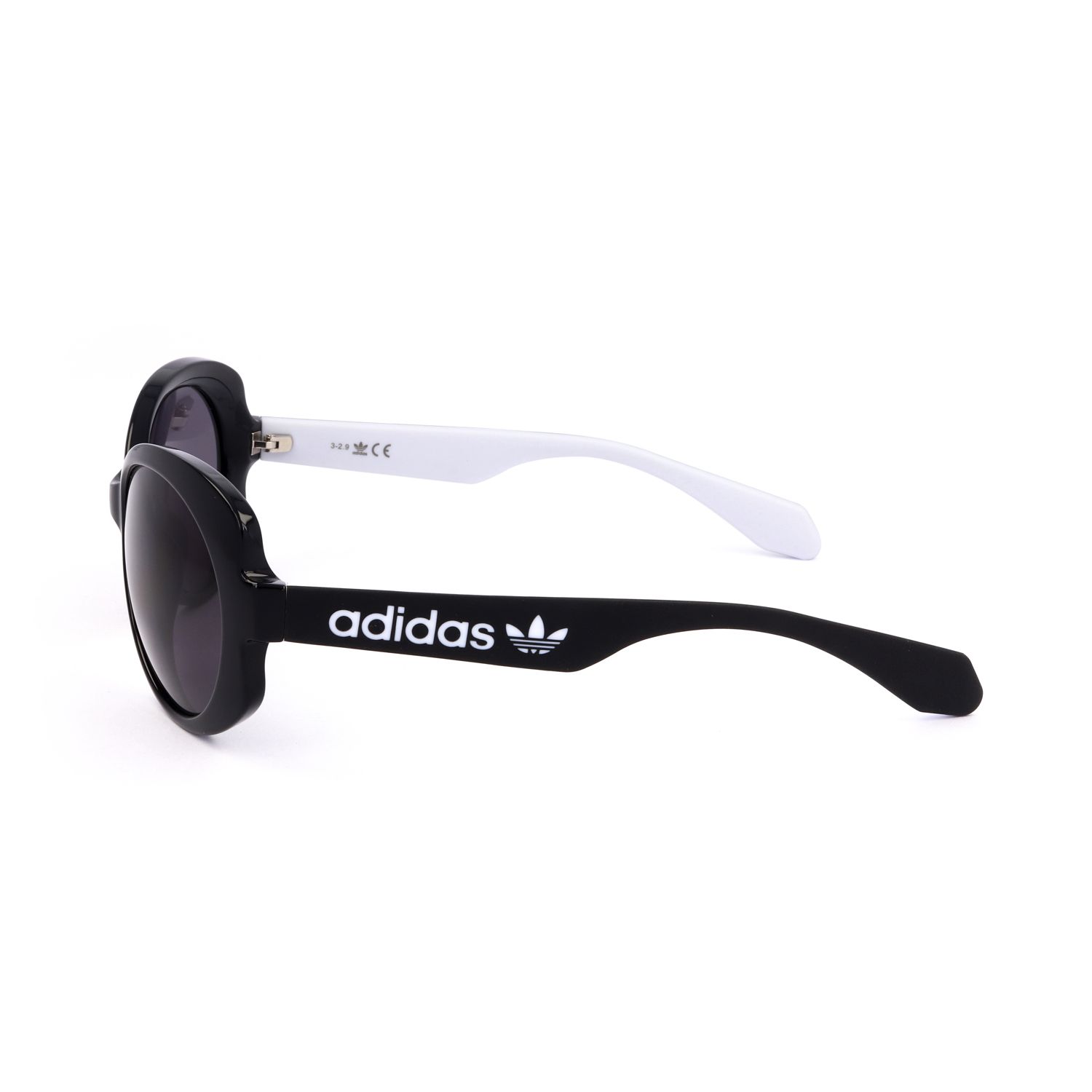 Occhiali da sole Adidas neri con asta bianca e logo.