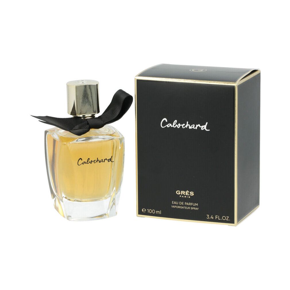 Flacone di profumo e scatola. Flacone con fiocco, scatola nera con testo. Marchio: Cabochard.