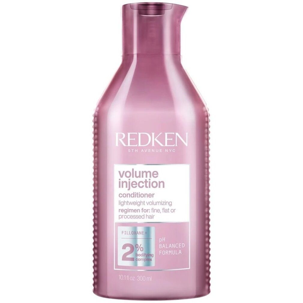 Flacone rosa con tappo rosso. Scritta: Redken Volume Injection Conditioner. 2% Filloxane.