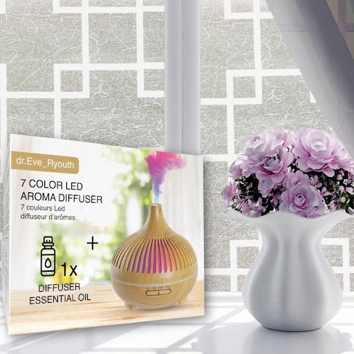 Diffusore di aromi in legno con illuminazione a LED e confezione. Scritta: 7 colori LED Aroma Diffuser.