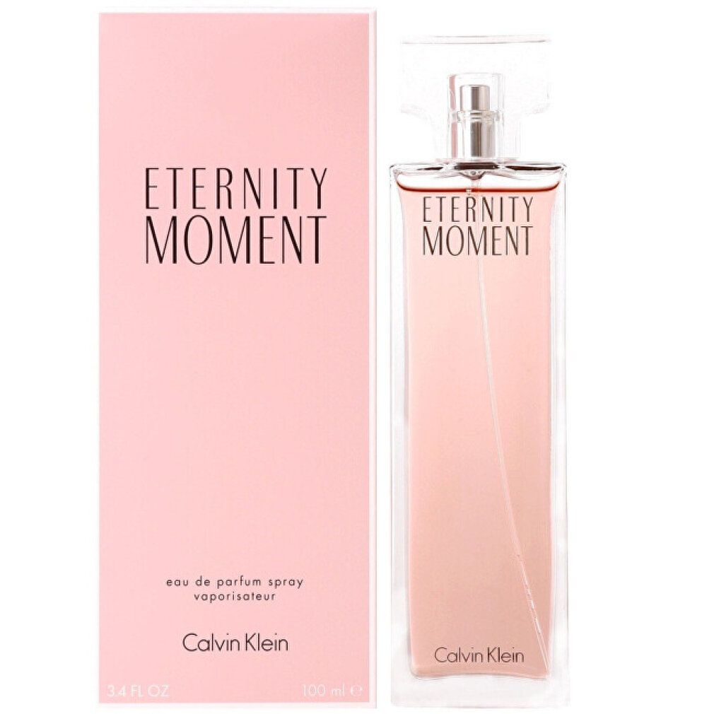Flacone e confezione. Flacone rettangolare, liquido rosa. Confezione rosa, scritta "Eternity Moment". Marchio Calvin Klein.