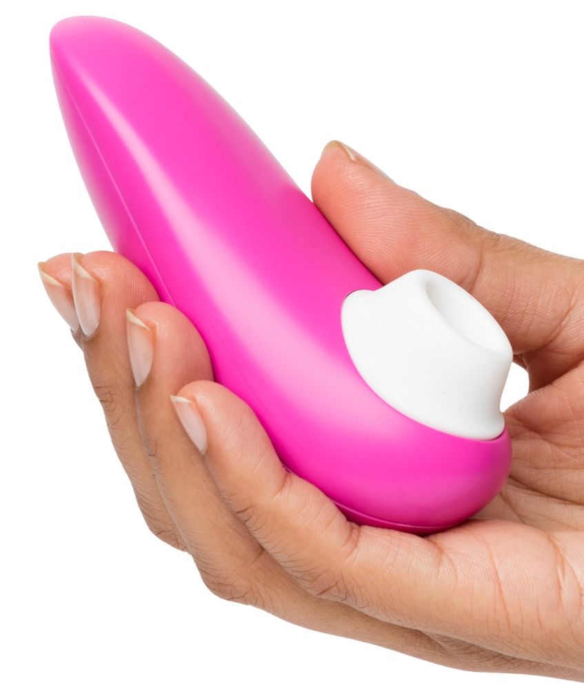 Un vibratore rosa con punta bianca, tenuto in mano.