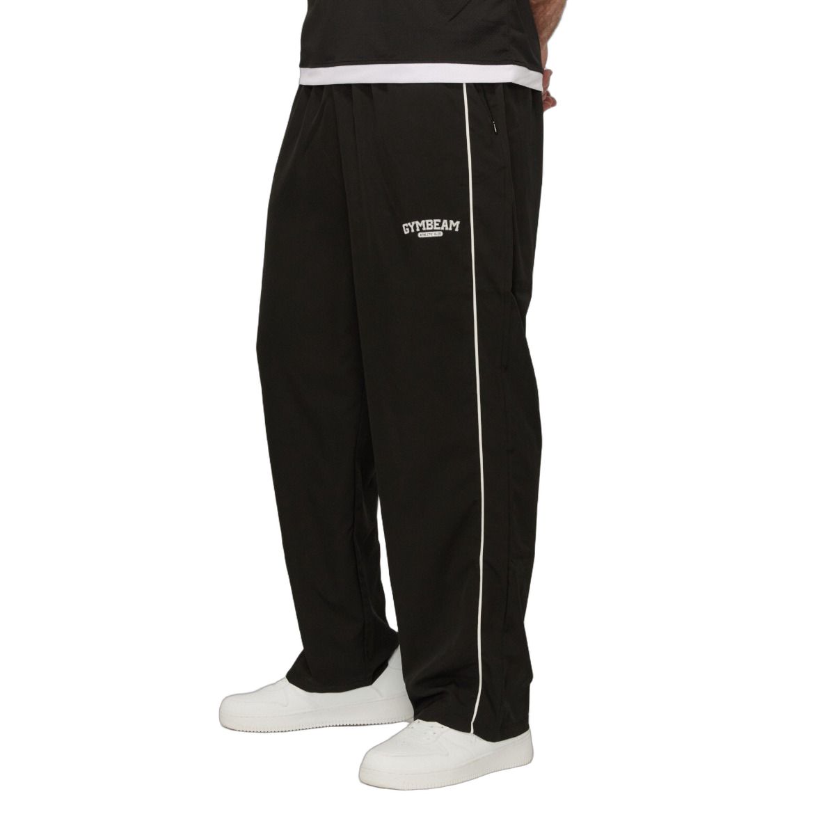 Vista laterale di un pantalone da jogging nero da uomo con striscia laterale bianca.