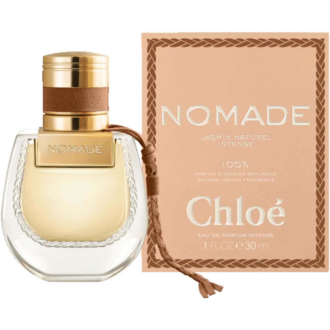 Flacone di profumo e confezione. Flacone con tappo dorato. Confezione con scritta NOMADE.