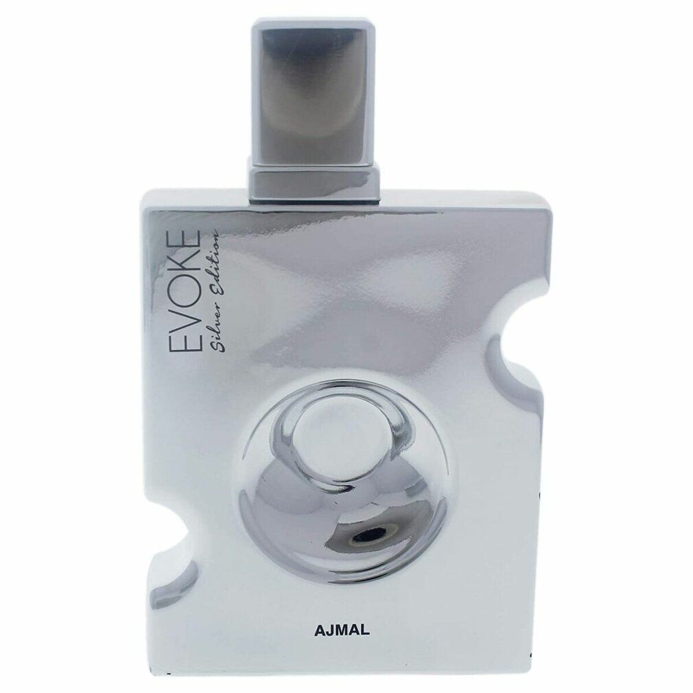 Flacone argentato con scritta 'EVOKE Silver Edition' e 'AJMAL'. Forma quadrata con angoli arrotondati e tappo argentato.