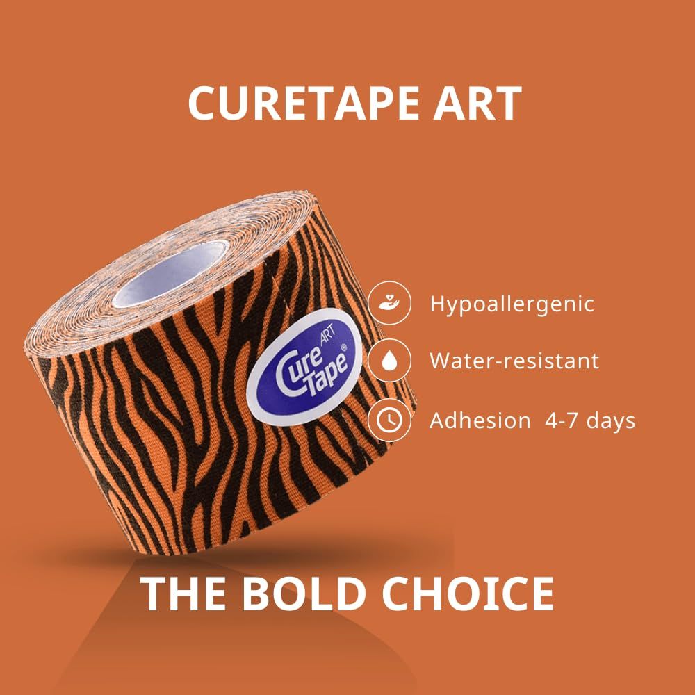 Rotolo di CureTape Art Tiger. Arancione con strisce nere. Caratteristiche: ipoallergenico, resistente all'acqua, adesione 4-7 giorni. Testo: The Bold Choice.