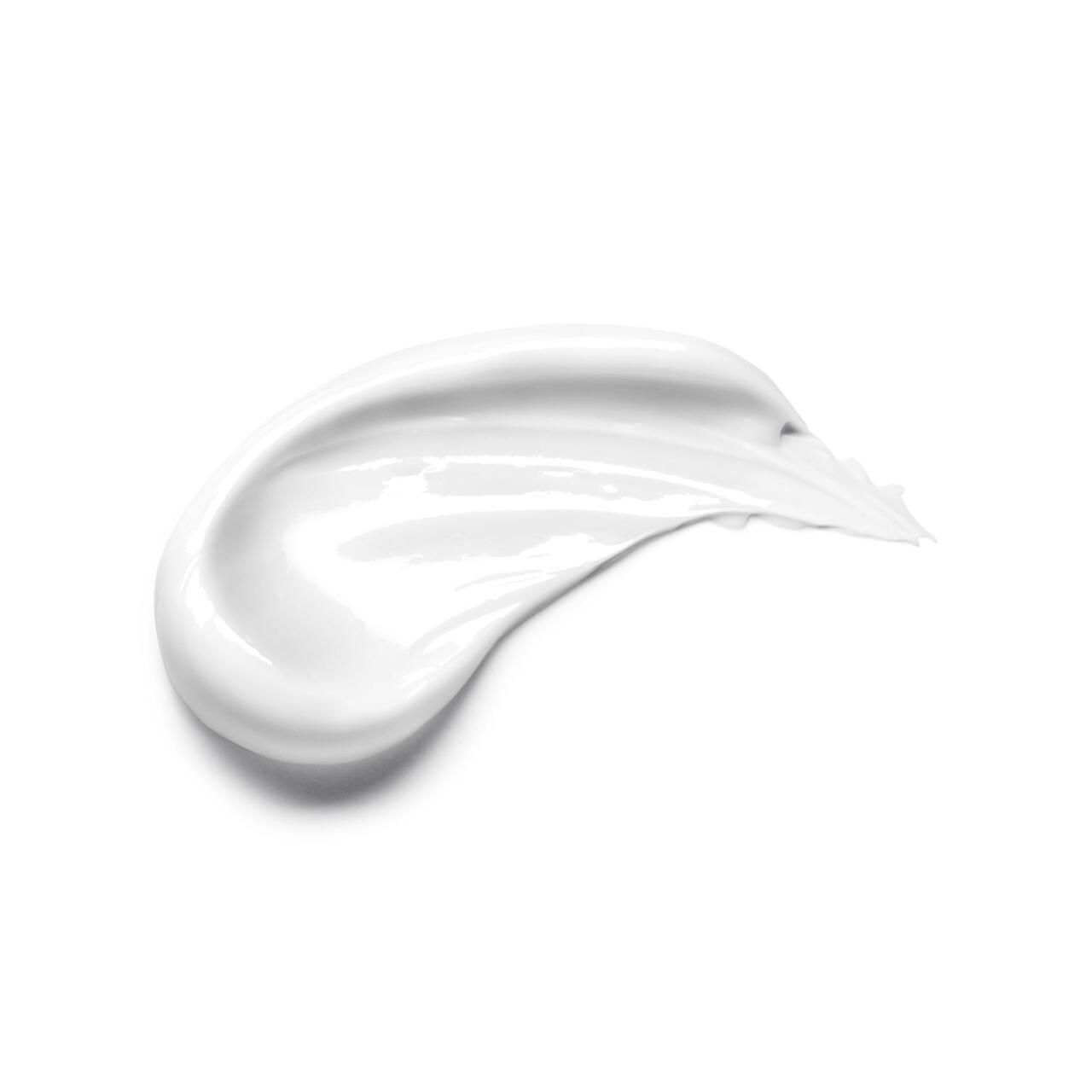 Macchia di crema bianca su sfondo bianco. Consistenza liscia.
