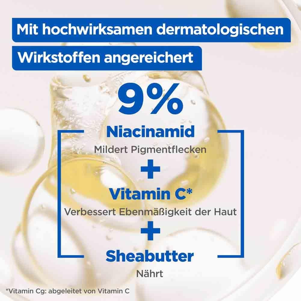 Primo piano di liquido con bolle. Testo: 9% Niacinamide, riduce le macchie pigmentarie + Vitamina C, migliora l'uniformità + Burro di Karité.