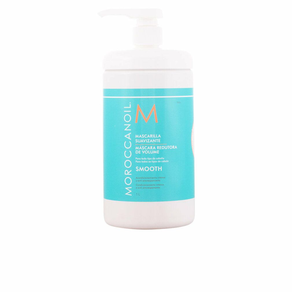 Contenitore bianco con etichetta blu. Scritta Moroccanoil, Mascarilla Suavizante, M. Con pompa.