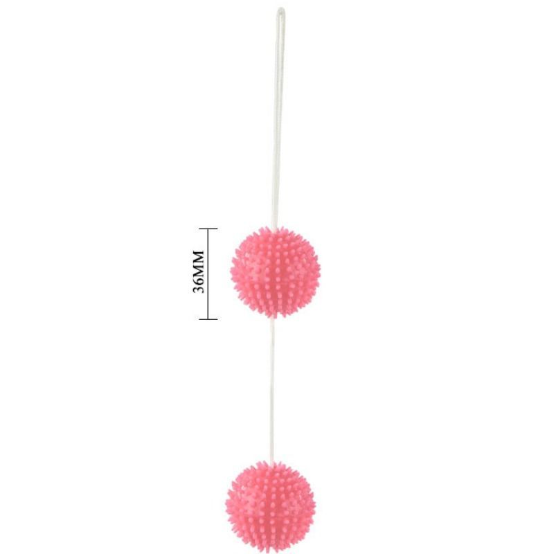 Due palline rosa con punte, diametro 36mm, su un cordino.