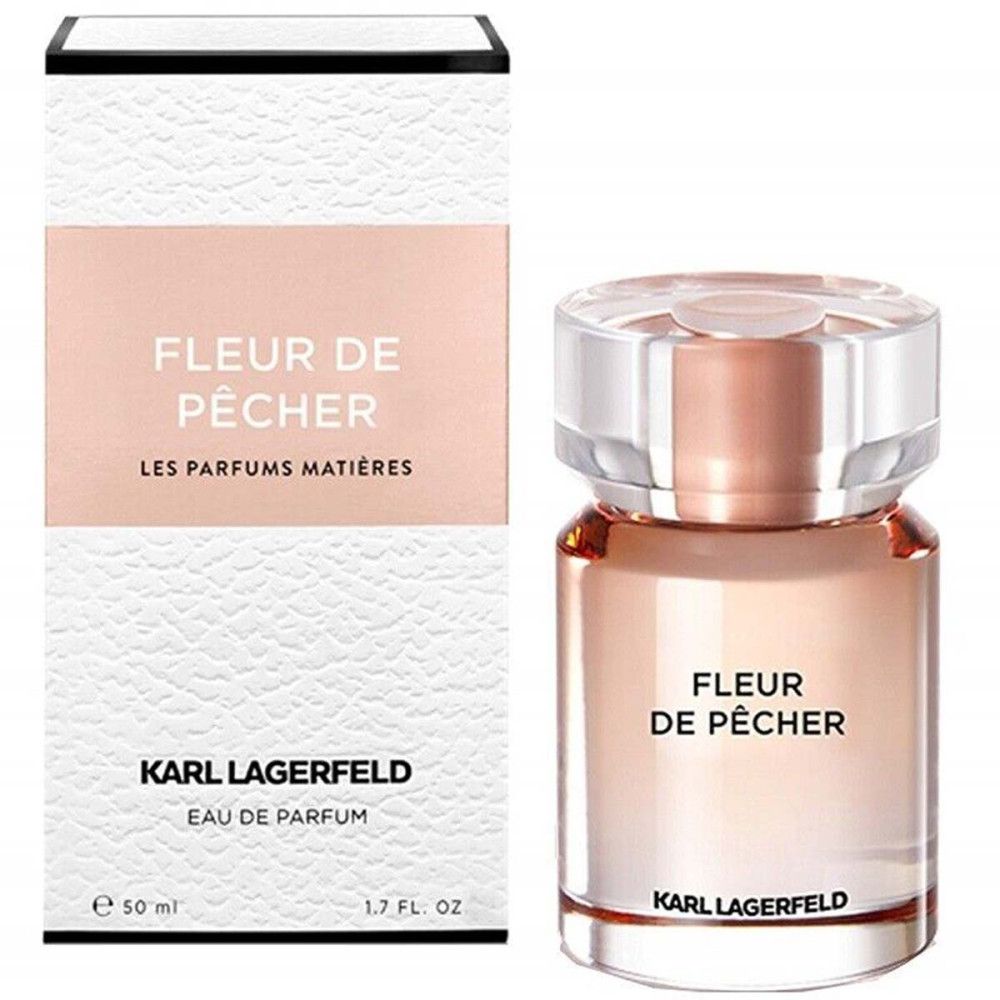 Flacone e confezione Fleur de Pêcher Eau de Parfum. Design bianco-rosa con testo. Logo Karl Lagerfeld.