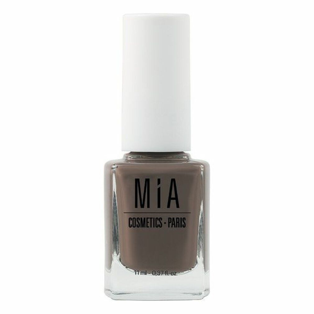Flacone di smalto marrone con tappo bianco. Scritta: Mía Cosmetics Paris. Volume: 11 ml.