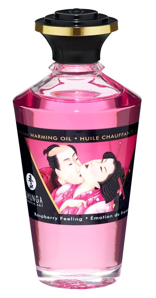 Flacone di olio da massaggio rosa. Scritta: Shunga, aroma lampone. Illustrazione: coppia che si bacia. Flacone: vetro, tappo nero.