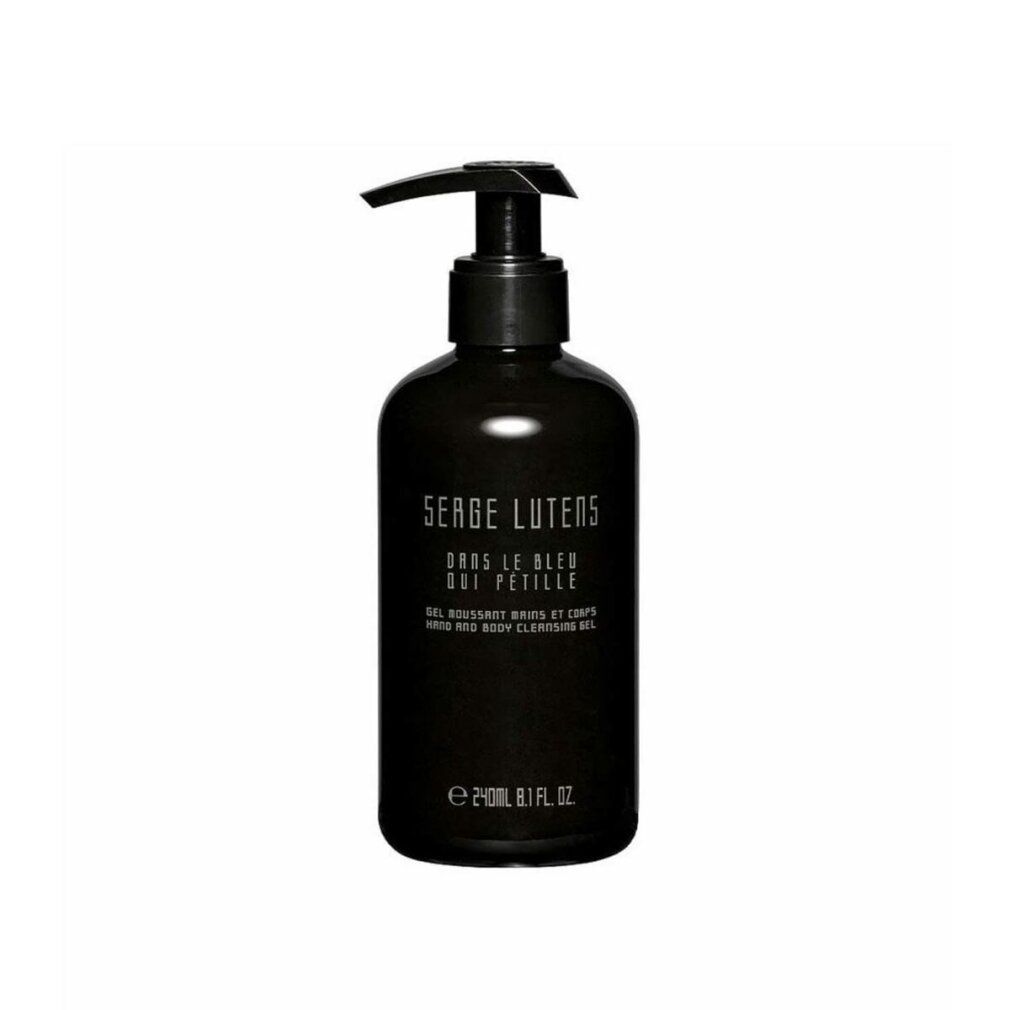 Flacone blu scuro con dosatore nero. Scritta: Serge Lutens, Dans Le Bleu Qui Petille, Gel moussant mains et corps. 240ml.