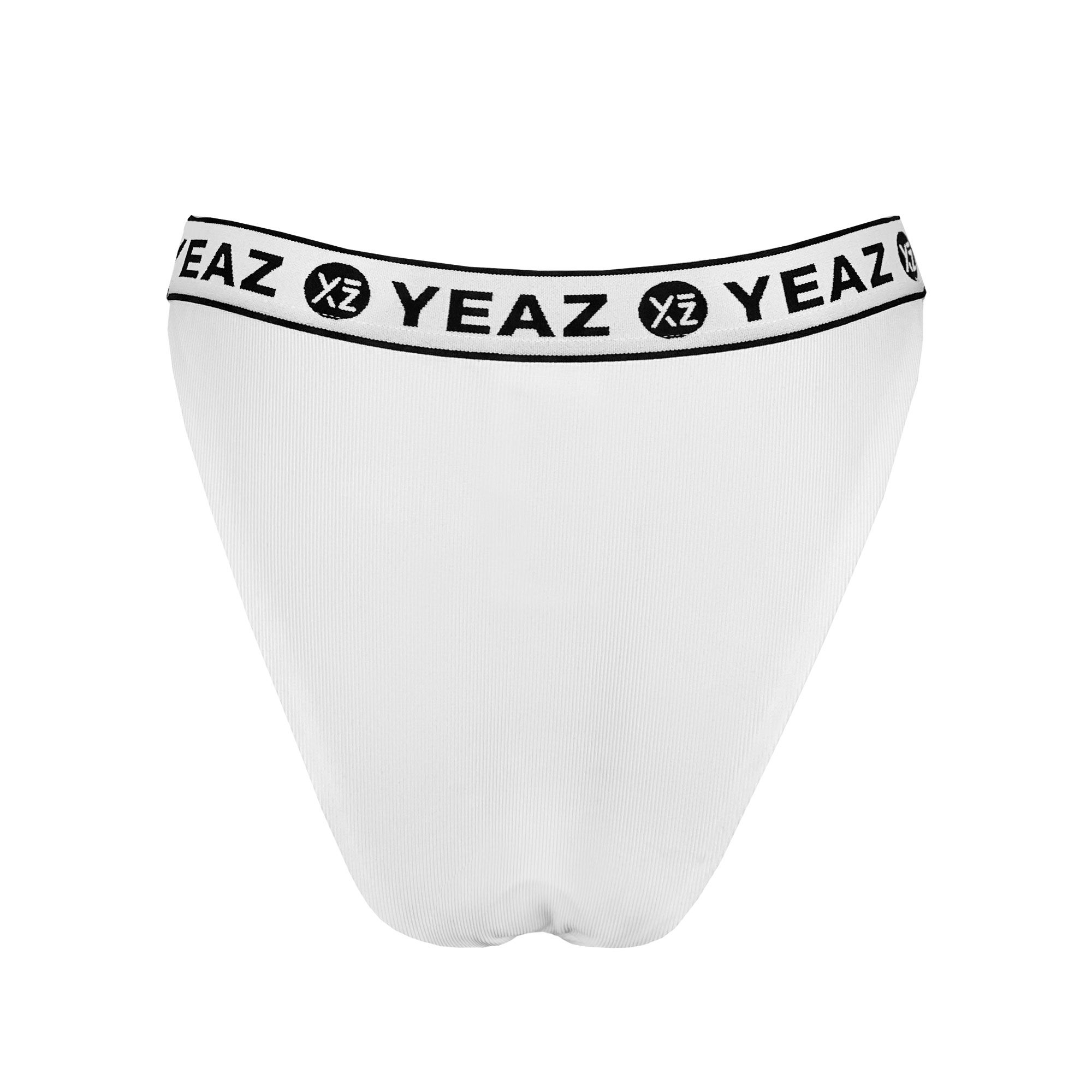 Slip bianco con fascia in vita nera e logo bianco.