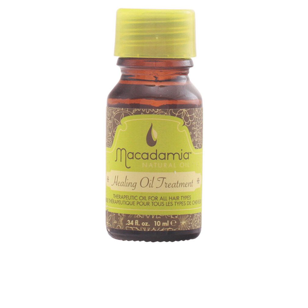 Piccola bottiglia marrone con tappo ed etichetta verdi. Scritta: Macadamia Healing Oil Treatment.