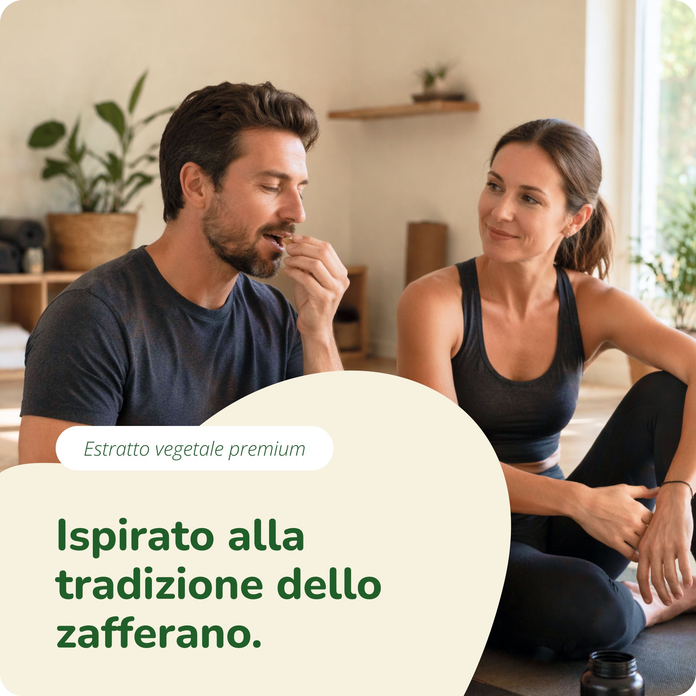 Uomo e donna in abbigliamento sportivo, l'uomo mangia una capsula, la donna guarda.