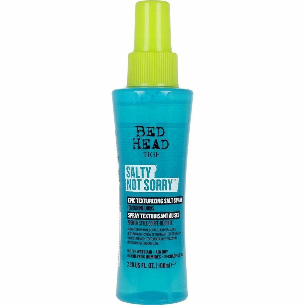 Flacone spray blu turchese con erogatore verde. Scritta: Bed Head Tigi Salty Not Sorry Epic Texturizing Salt Spray.