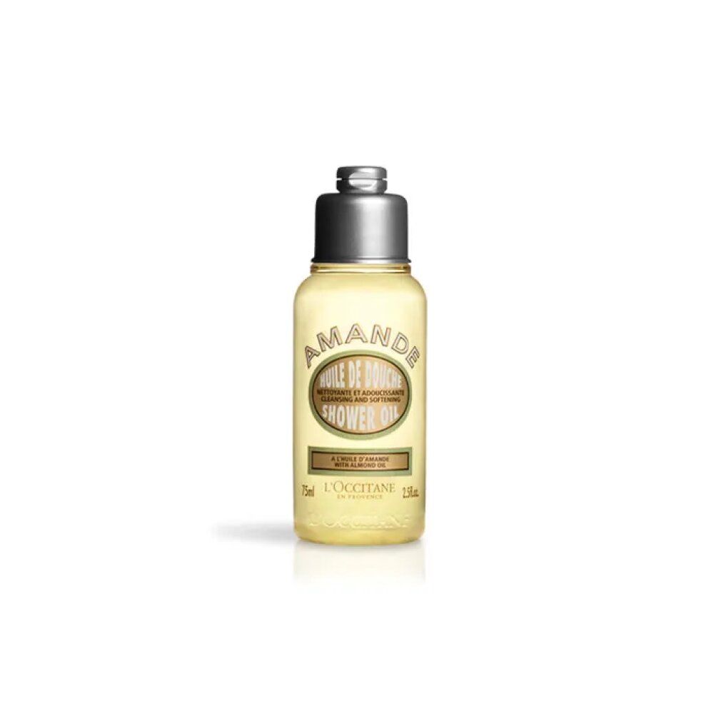 Flacone di olio doccia trasparente con tappo argentato. Scritte: Amande, Shower Oil, L'Occitane.