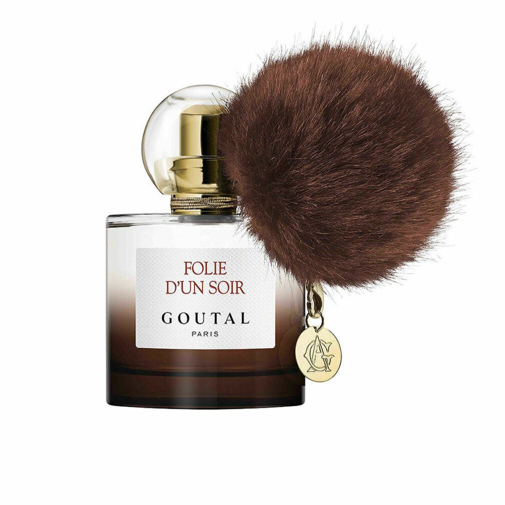 Flacone di profumo con pennello marrone e ciondolo. Scritta: Folie d'Un Soir, Goutal Paris. Flacone in vetro.