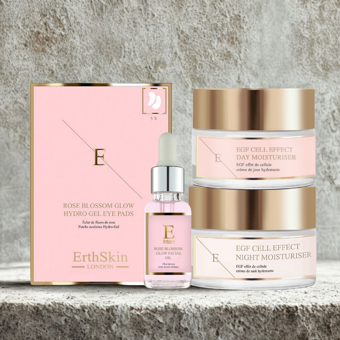 Set con patch occhi, olio viso e due creme. Confezione rosa e oro. Scritte: EGF Cell Effect, Day Moisturiser, Night Moisturiser. Testo: ErthSkin London.