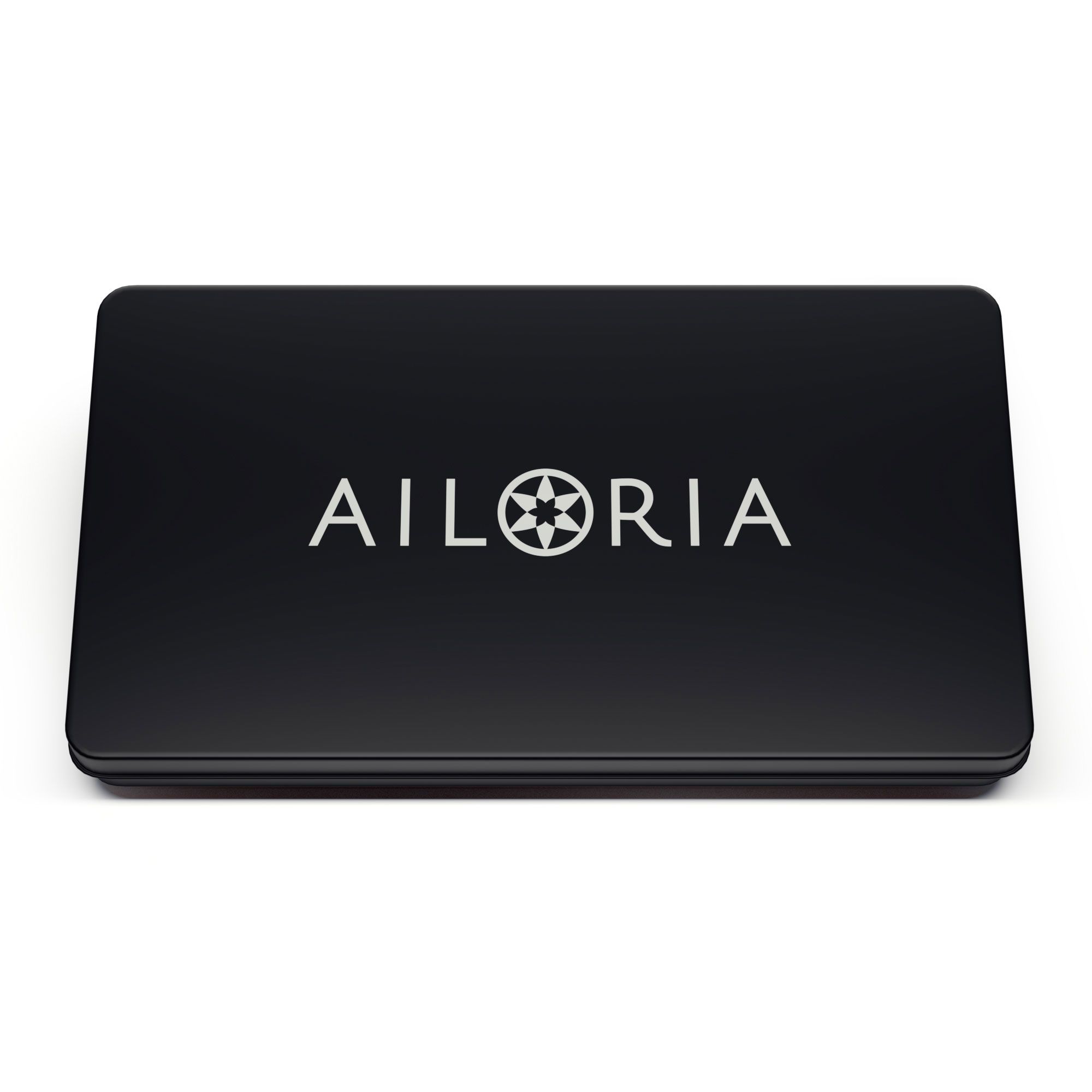 Scatola nera chiusa con logo AILORIA argentato. Contiene strumenti odontoiatrici.