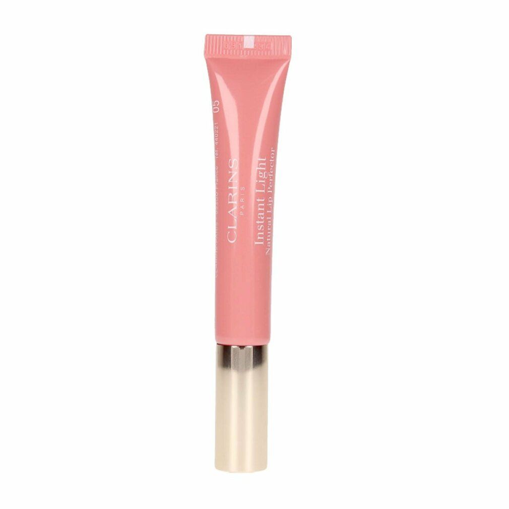 Tubo di balsamo labbra rosa. Tappo dorato. Scritta: Clarins Instant Light Natural Lip Perfector #05.