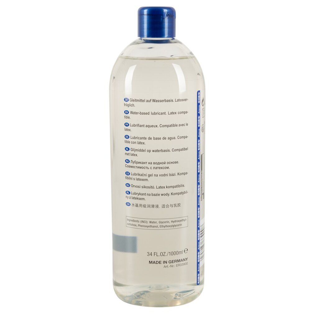 Retro di un flacone trasparente con tappo blu. Informazioni multilingue sul prodotto.