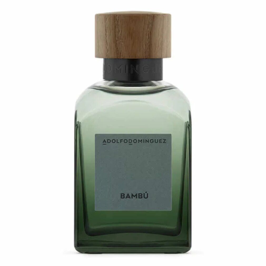 Flacone rettangolare verde con tappo in legno. "Bambú" sull'etichetta. Marchio ADOLFO DOMINGUEZ.
