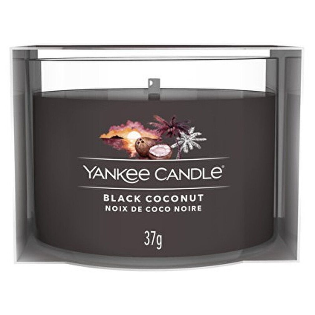 Candela nera in confezione trasparente. Scritta: Yankee Candle, Black Coconut, Noix de Coco Noire, 37g.