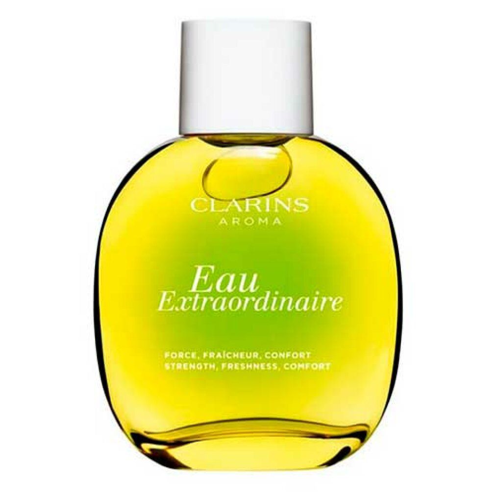 Flacone rotondo con liquido giallo. Scritta: Clarins Aroma Eau Extraordinaire. Tappo bianco.