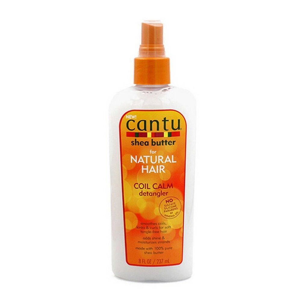 Cantu Coil Calm Detangler. Flacone bianco con erogatore arancione. Etichetta con informazioni sul prodotto.