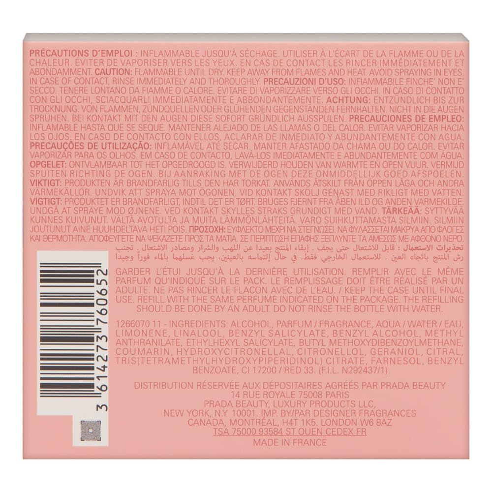 Confezione con testo. Sfondo rosa, testo multilingue, codice a barre, ingredienti, informazioni produttore.