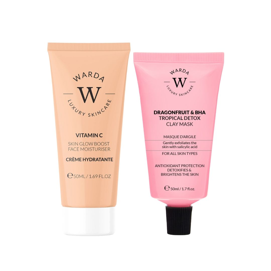 Due tubi Warda Luxury Skincare. Crema arancione con vitamina C e maschera rosa con BHA. Chiusure nere.