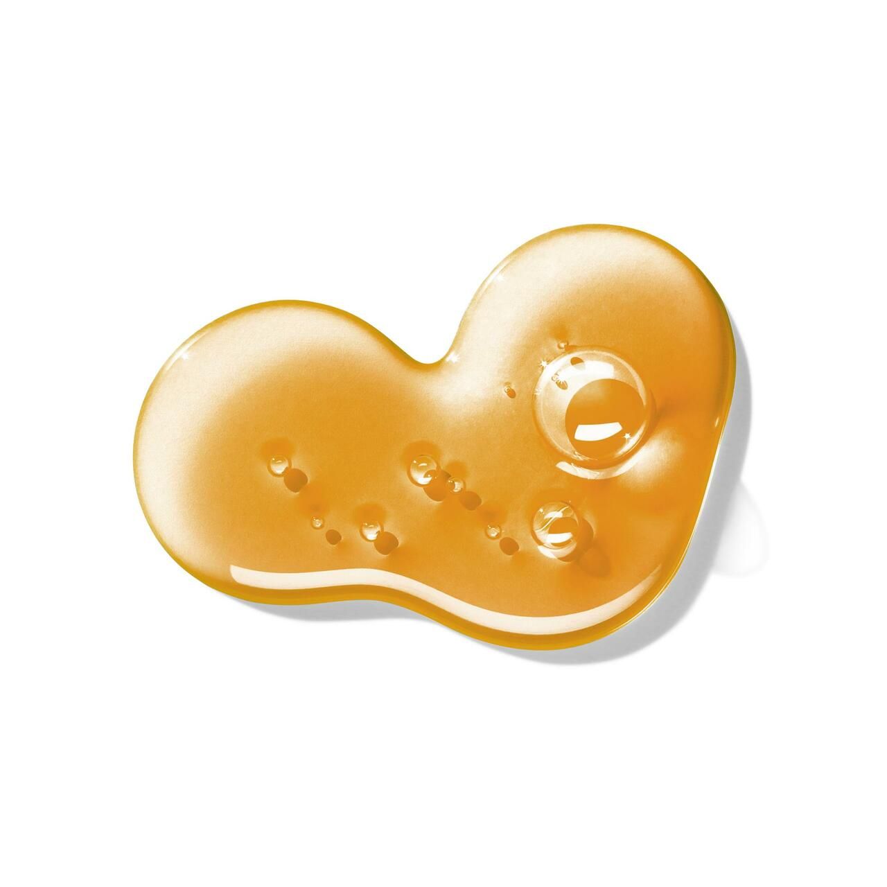 Gel arancione-giallo con bolle su sfondo bianco. A forma di doppio cuore.
