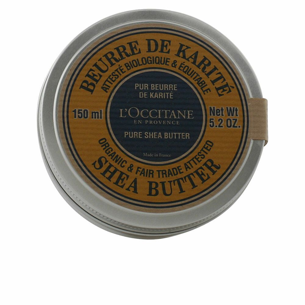 Barattolo d'argento con etichetta gialla. Scritta: Shea Butter, 150 ml, 5.2 oz.