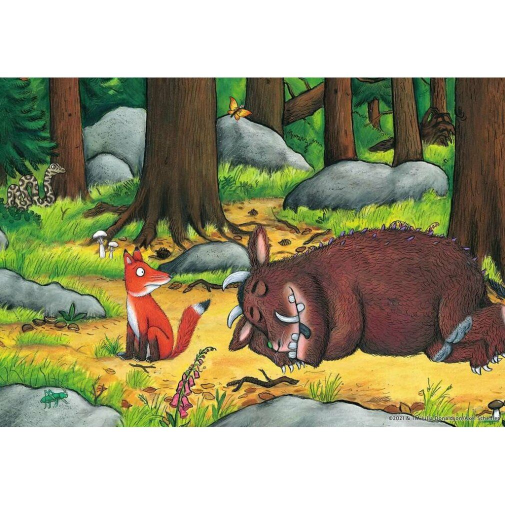 Illustrazione: scena della foresta con volpe e Gruffalo sdraiato. Alberi, rocce e farfalla.