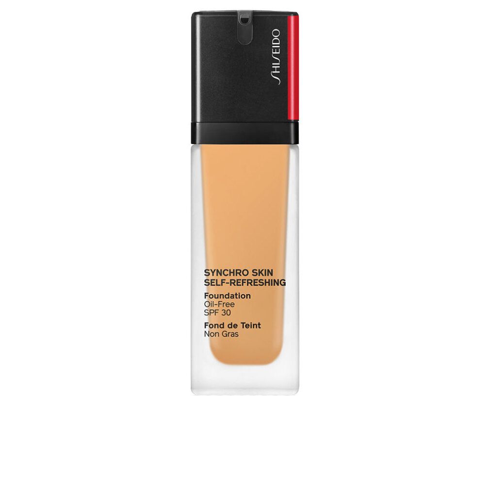 Fondotinta liquido in bottiglia rettangolare di vetro con tappo nero. Testo: Synchro Skin Self-Refreshing, Foundation, Oil-Free, SPF 30, Fond de Teint Non Gras.