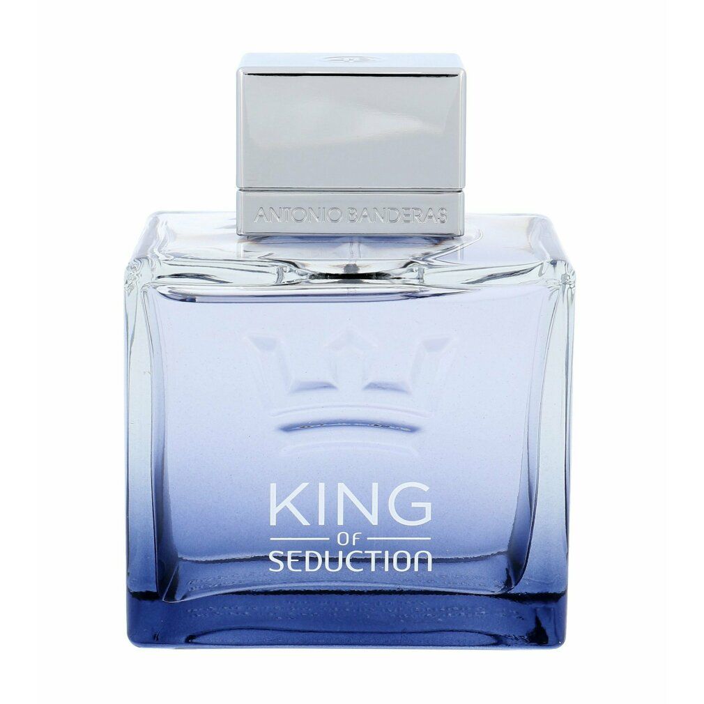 Flacone in vetro con sfumatura blu e tappo argentato. Scritta King of Seduction. Marchio: Antonio Banderas. Corona.