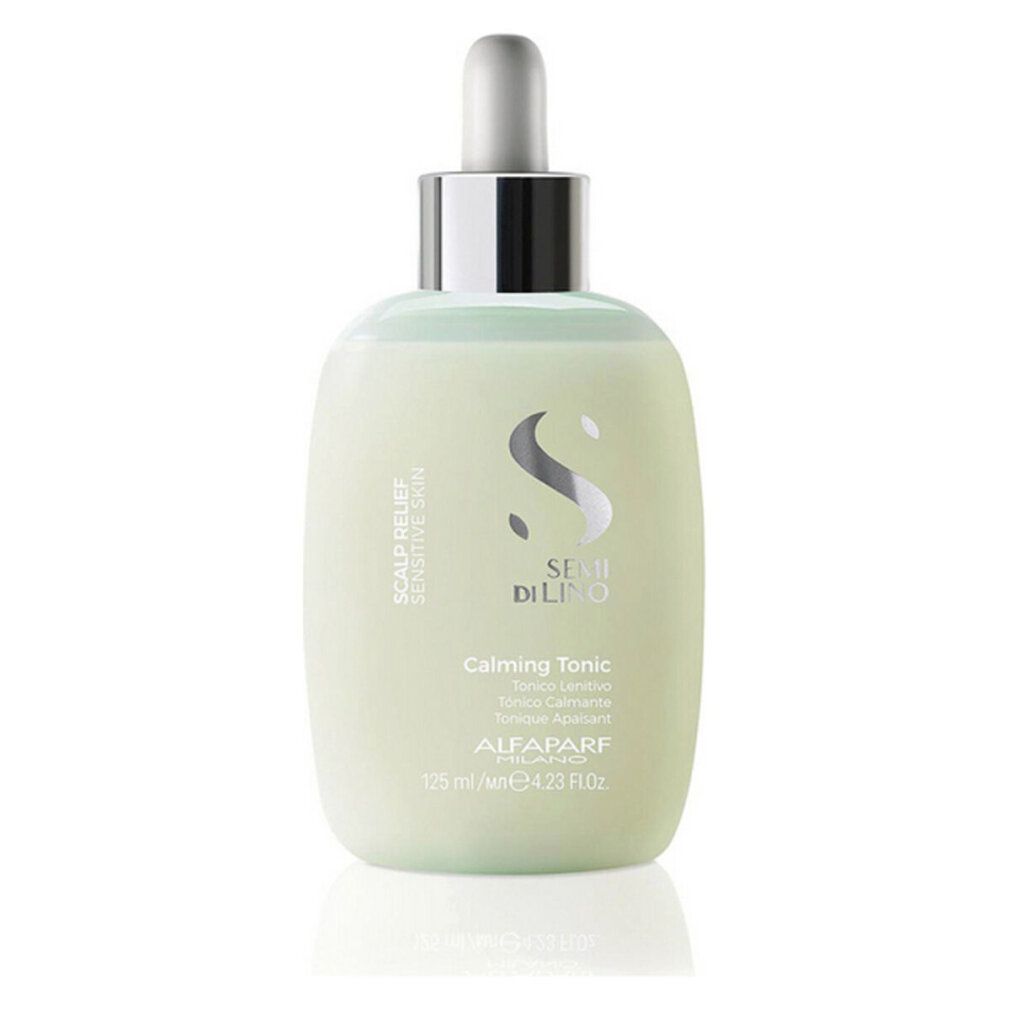 Flacone con contagocce. Scritta: Semi Di Lino, Calming Tonic, Alfaparf Milano. Liquido verde chiaro.