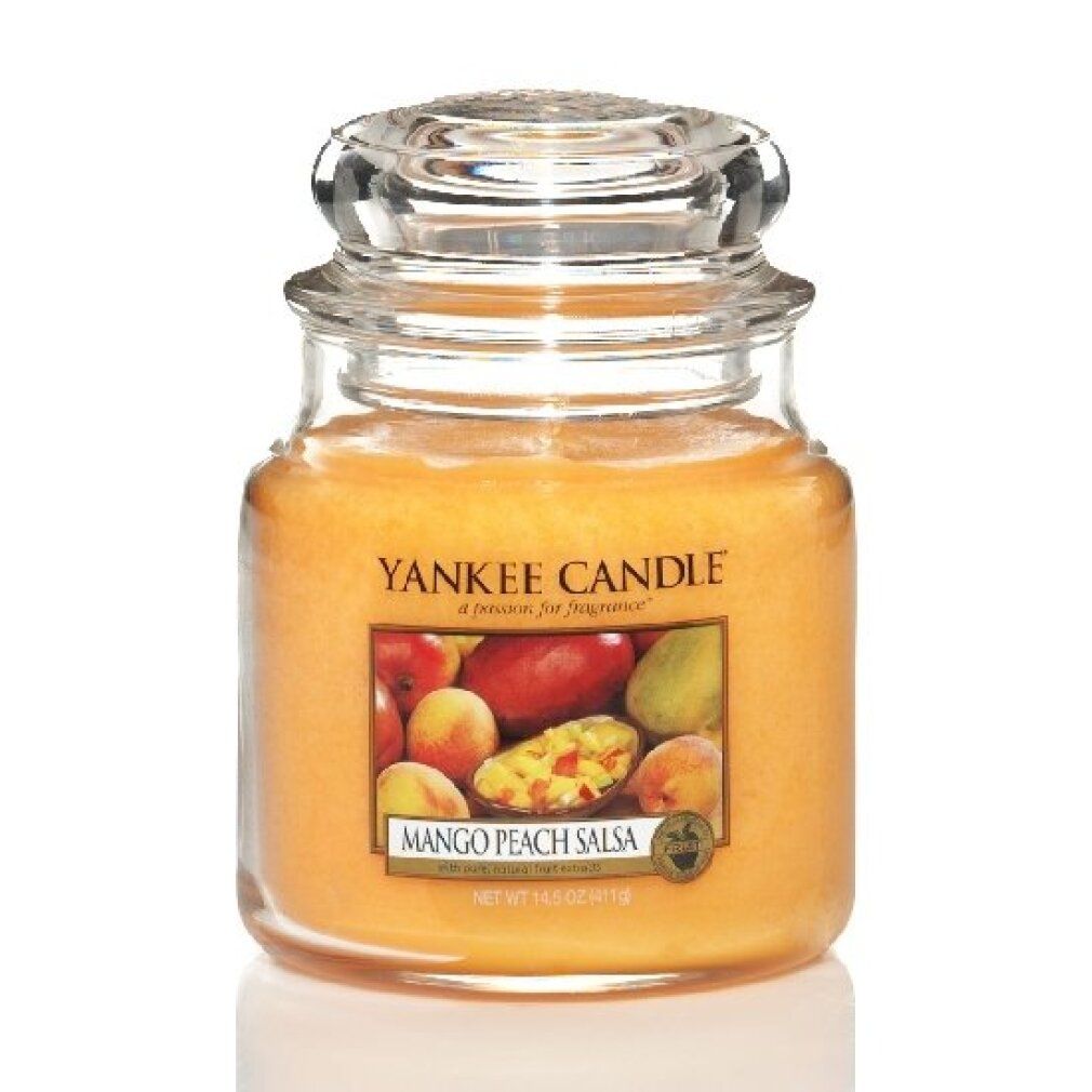 Candela profumata Mango Peach Salsa in vaso con coperchio. Etichetta con frutta. Marchio: Yankee Candle.