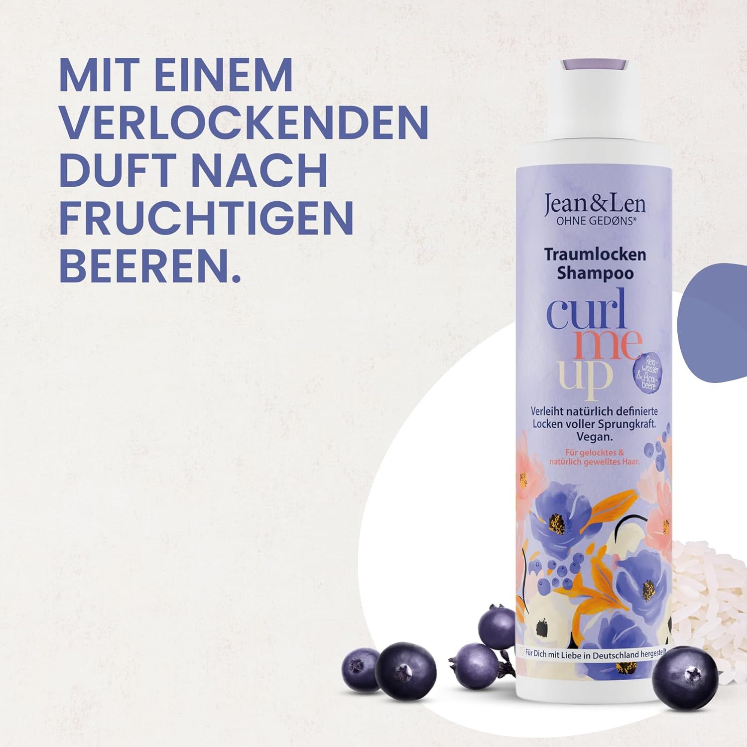 Flacone di shampoo. Testo: Con un invitante profumo di frutti di bosco. Accanto bacche e riso.