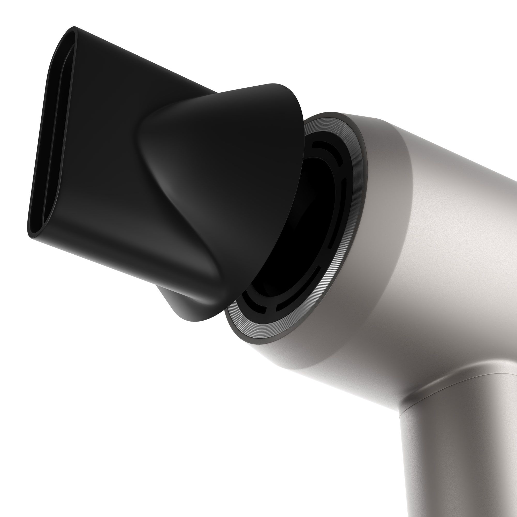 Primo piano di un asciugacapelli grigio con ugello nero. Ugello attaccato. Corpo grigio, apertura nera.