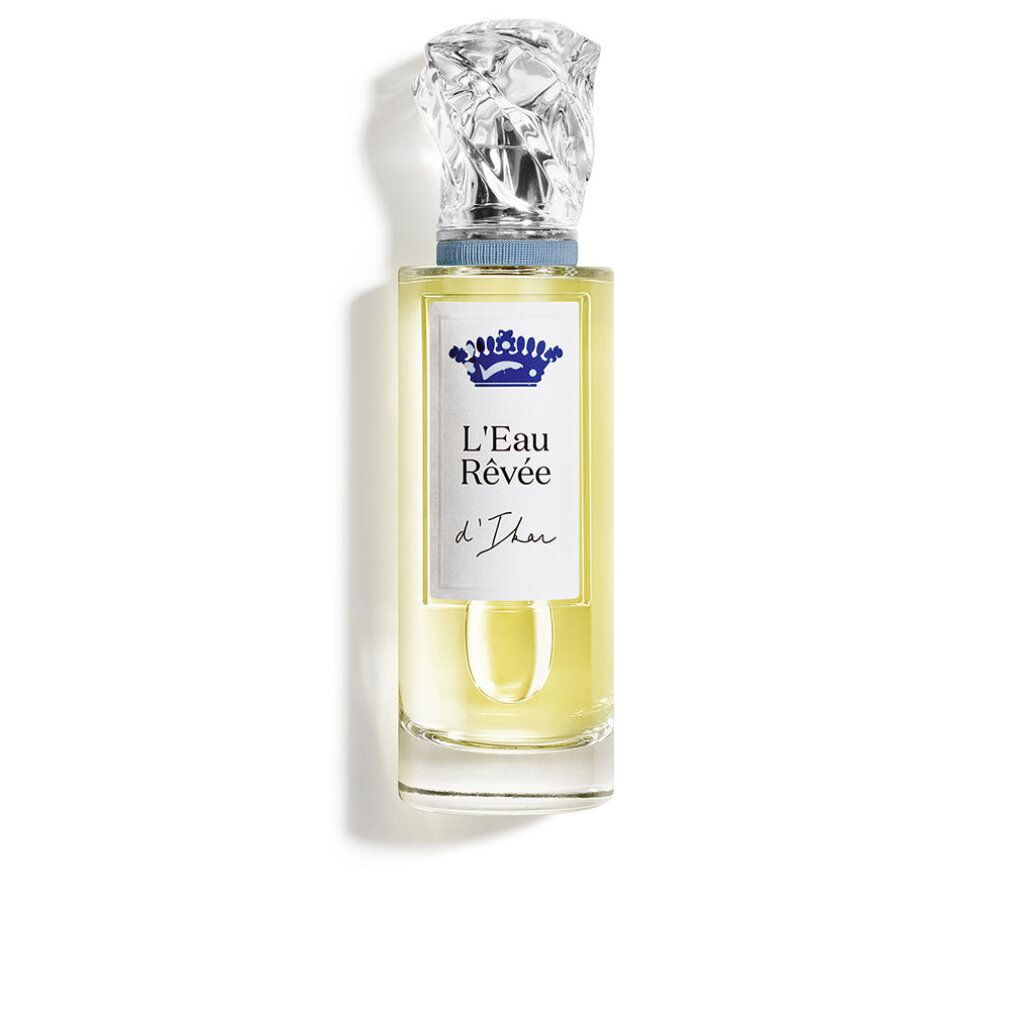 Flacone in vetro con tappo argentato. Scritta: L'Eau Rêvée d'Ikar. Liquido giallo chiaro visibile.