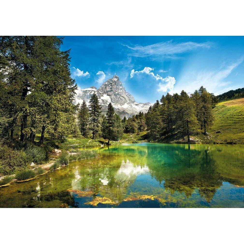 Puzzle con paesaggio. 1500 pezzi. Marchio Clementoni. Rappresentazione: lago di montagna con panorama.