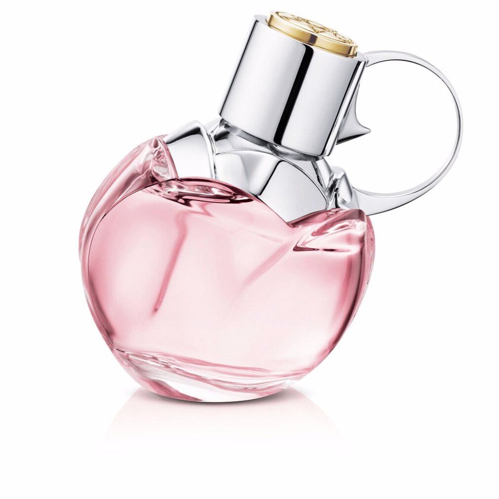 Azzaro Wanted Girl Tonic Eau De Toilette Spray. Flacone a forma di granata, tappo argentato. Liquido rosa visibile.