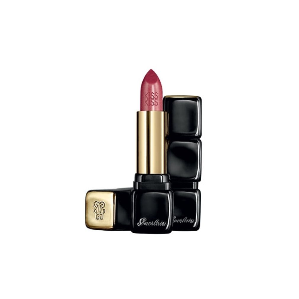 Rossetto con astuccio nero e tubo dorato. "KISS KISS" sul rossetto. Astuccio aperto.
