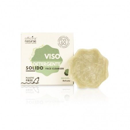 Detersivo solido viso e confezione. Il prodotto è verde chiaro, a forma di fiore. La confezione mostra il nome del marchio e la denominazione del prodotto.